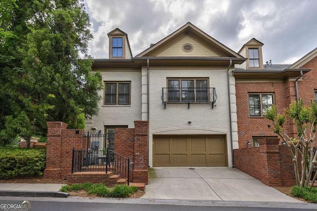 3127 Lenox Rd NE Unit 1, Atlanta, GA 30324 - view of front facade with concrete driveway, brick siding, and an attached garage