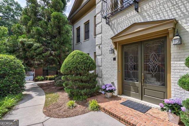 3127 Lenox Rd NE Unit 1, Atlanta, GA 30324 - property entrance with french doors and brick siding