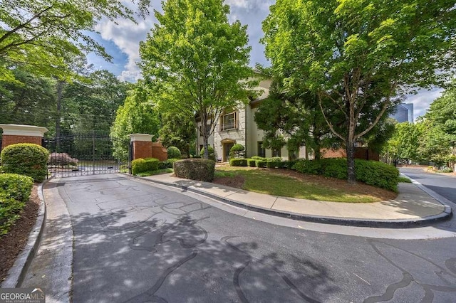 3127 Lenox Rd NE Unit 1, Atlanta, GA 30324 - exterior space with curbs, sidewalks, and a gate