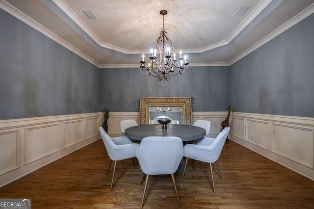 3127 Lenox Rd NE Unit 1, Atlanta, GA 30324 - dining room featuring a tray ceiling, an inviting chandelier, dark wood-type flooring, and a wainscoted wall