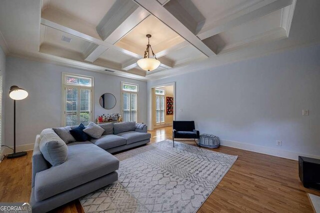 3127 Lenox Rd NE Unit 1, Atlanta, GA 30324 - living room with coffered ceiling, wood finished floors, baseboards, and beamed ceiling