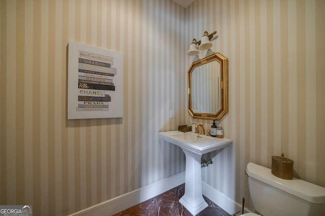 3127 Lenox Rd NE Unit 1, Atlanta, GA 30324 - half bath with toilet, marble finish floor, and baseboards