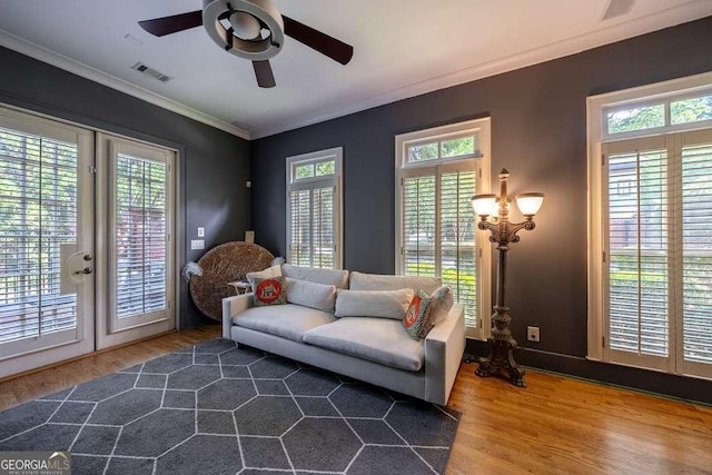 3127 Lenox Rd NE Unit 1, Atlanta, GA 30324 - living area with ceiling fan, plenty of natural light, visible vents, and wood finished floors