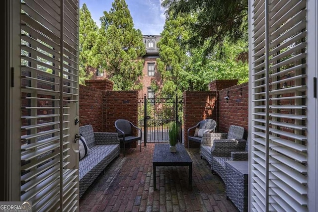 3127 Lenox Rd NE Unit 1, Atlanta, GA 30324 - view of patio / terrace with an outdoor living space and fence