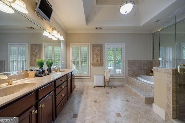 3127 Lenox Rd NE Unit 1, Atlanta, GA 30324 - full bathroom featuring a tray ceiling, a bath, visible vents, and a sink