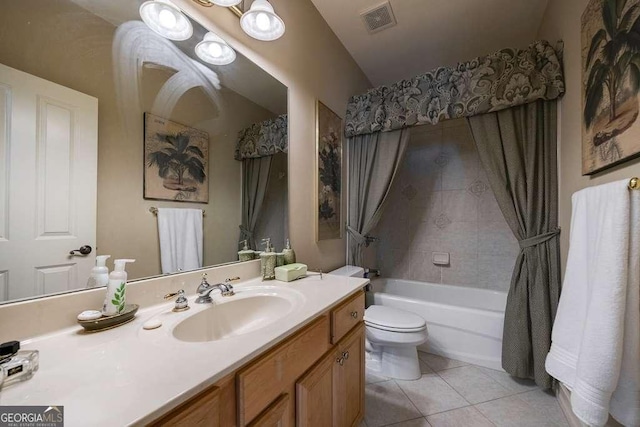 3127 Lenox Rd NE Unit 1, Atlanta, GA 30324 - full bath featuring shower / bathing tub combination, toilet, vanity, visible vents, and tile patterned flooring