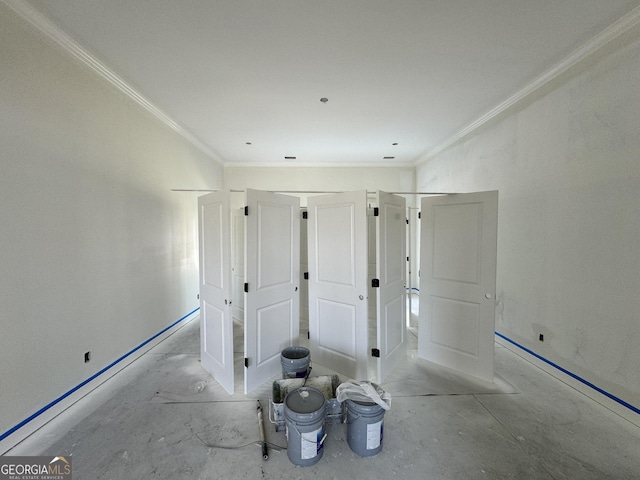 47 Ennis Rd, Pembroke, GA 31321 - spare room featuring crown molding, unfinished concrete floors, and baseboards