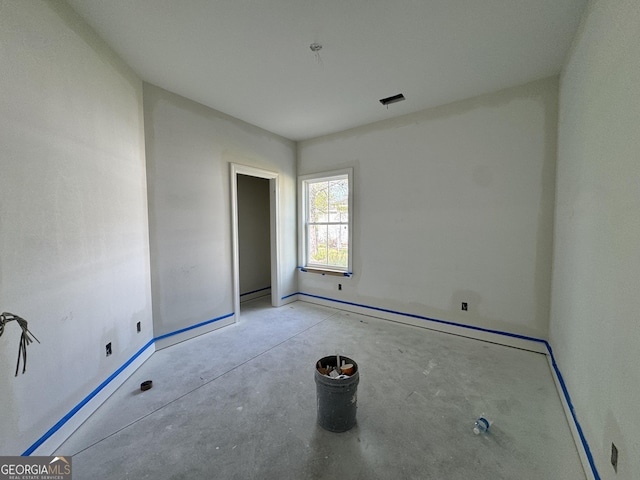 47 Ennis Rd, Pembroke, GA 31321 - unfurnished bedroom featuring baseboards and concrete flooring