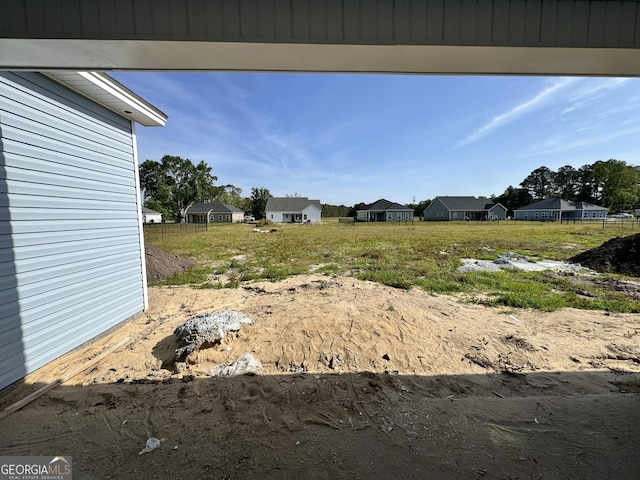 47 Ennis Rd, Pembroke, GA 31321 - view of yard with a residential view