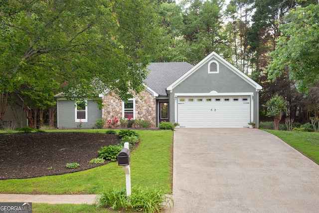 1605 Barrier Rd, Marietta, GA 30066 - view of front of home featuring a garage, concrete driveway, a front lawn, and stone siding