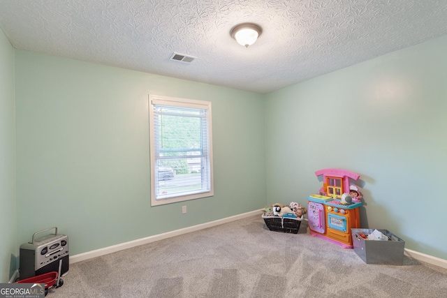 1605 Barrier Rd, Marietta, GA 30066 - rec room featuring carpet, a textured ceiling, and baseboards