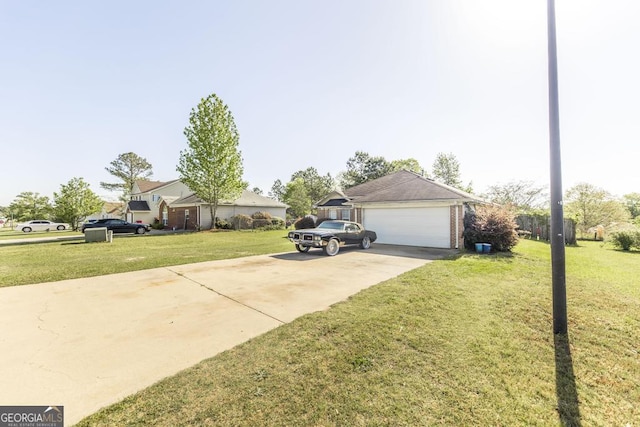 view of home's exterior featuring a yard, concrete driveway, and an attached garage