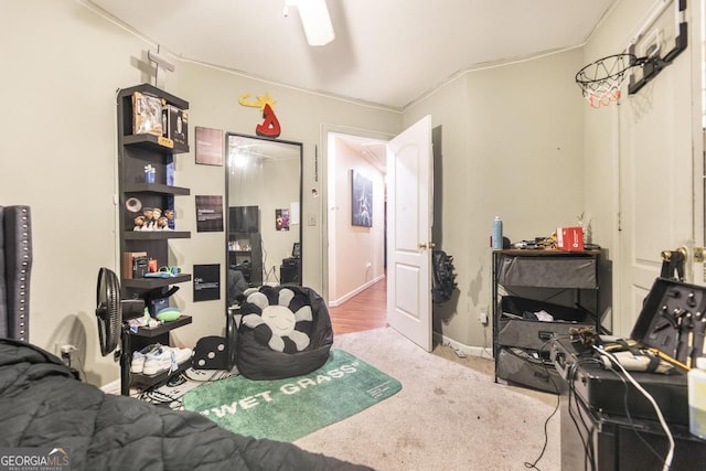 carpeted bedroom featuring baseboards