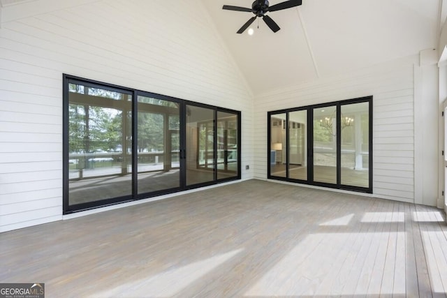 1301 Grayson Pointe Dr, Buckhead, GA 30625 - unfurnished sunroom featuring vaulted ceiling and a water view