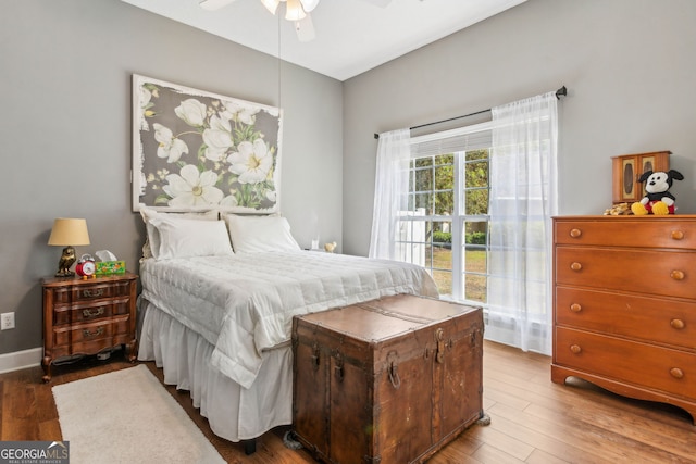 bedroom featuring wood finished floors and ceiling fan