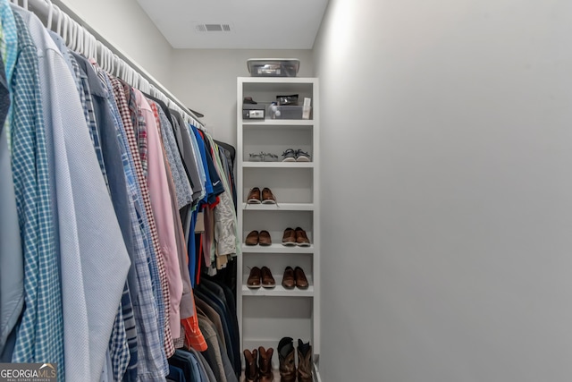 spacious closet featuring visible vents