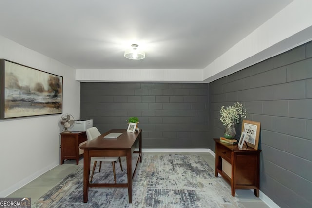 office space featuring baseboards