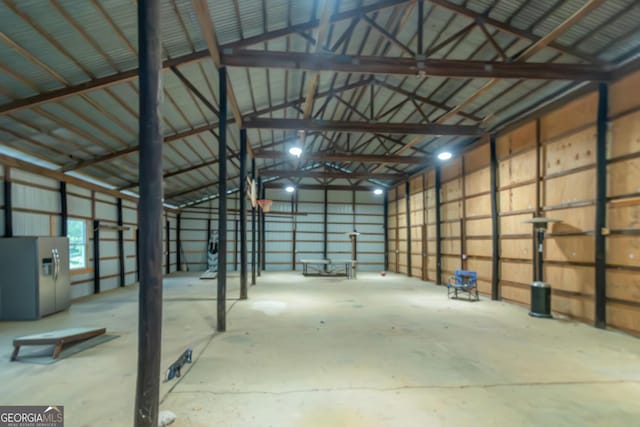 garage featuring refrigerator