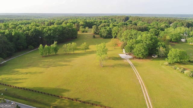 aerial view featuring a view of trees