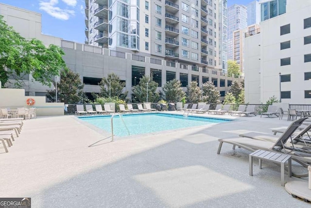 pool with a patio area