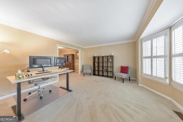 office featuring light carpet, crown molding, and baseboards