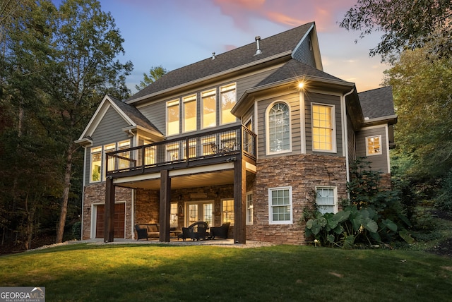 505 River Ridge Rd, Clarkesville, GA 30523 - rear view of house with a lawn, a balcony, an outdoor hangout area, stone siding, and roof with shingles