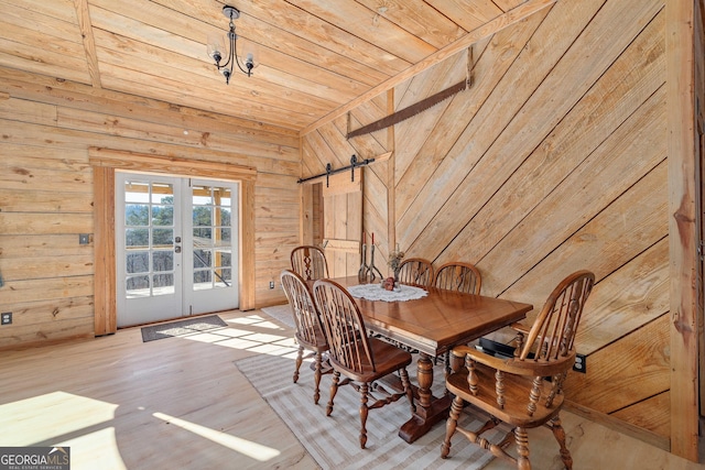 164 Delilah Ln, Lakemont, GA 30552 - dining space with wooden ceiling, wood walls, french doors, and wood finished floors