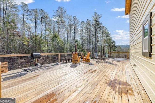 164 Delilah Ln, Lakemont, GA 30552 - wooden terrace featuring outdoor dining space and grilling area
