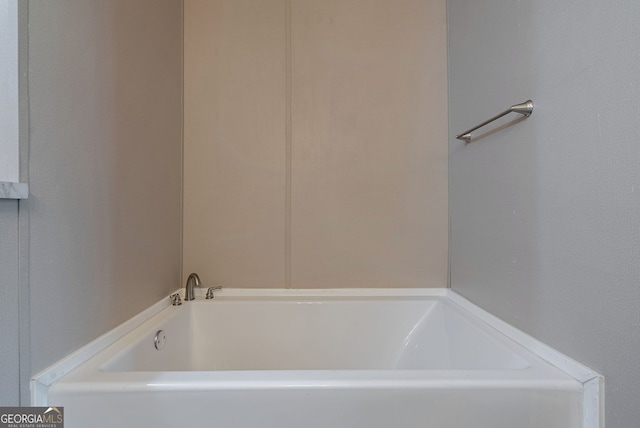 bathroom featuring a bath