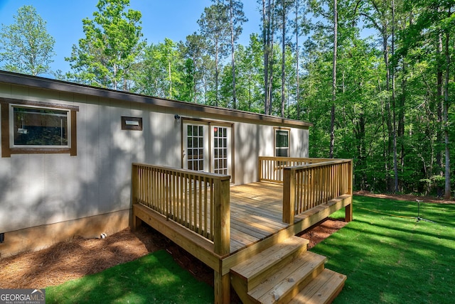 wooden deck with a yard