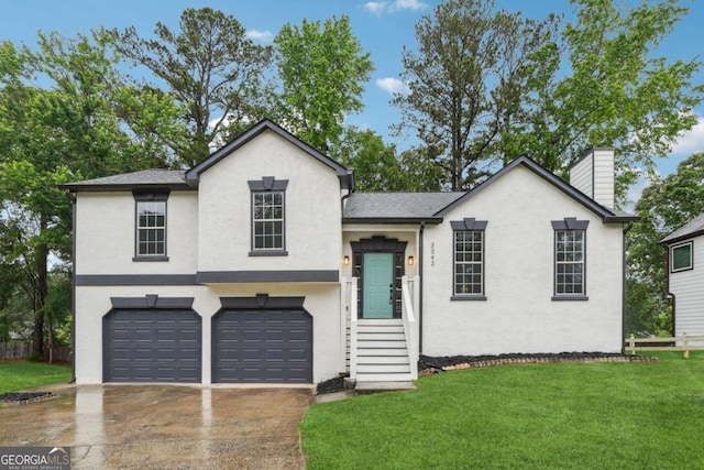 3343 Mooring Dr, Powder Springs, GA 30127 - split level home with a front yard, stucco siding, and driveway