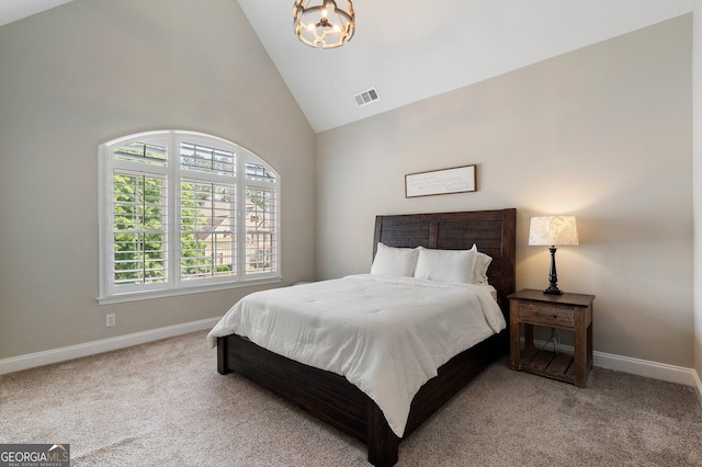 bedroom with baseboards, carpet, high vaulted ceiling, and a chandelier
