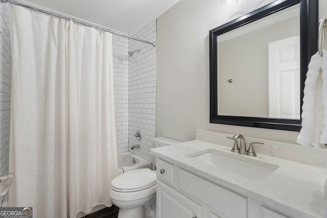 full bathroom featuring toilet, shower / tub combo with curtain, and vanity