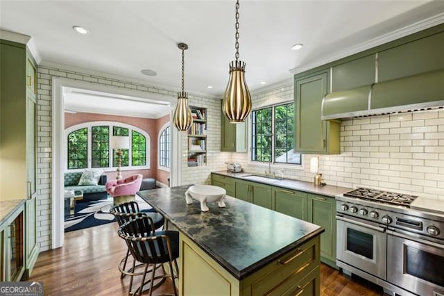 3086 Pine Valley Rd, Atlanta, GA 30305 - kitchen featuring green cabinetry, range with two ovens, a sink, dark wood-type flooring, and crown molding