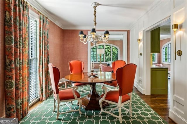 3086 Pine Valley Rd, Atlanta, GA 30305 - dining area with a chandelier, wood finished floors, and crown molding