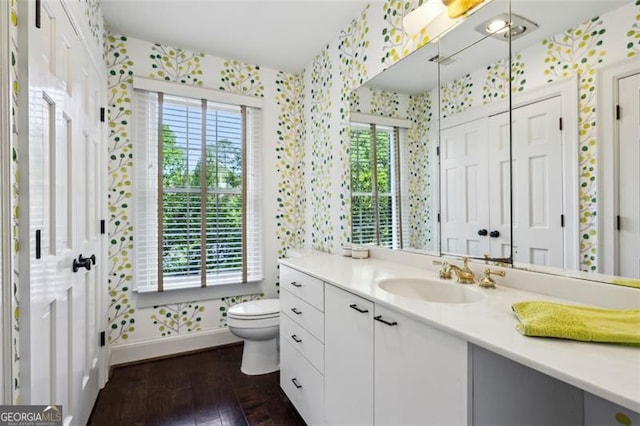 3086 Pine Valley Rd, Atlanta, GA 30305 - bathroom with wallpapered walls, baseboards, plenty of natural light, and toilet