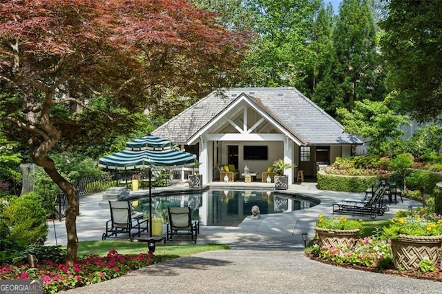 3086 Pine Valley Rd, Atlanta, GA 30305 - view of home's community with a storage structure, an outdoor structure, a patio, a swimming pool, and fence