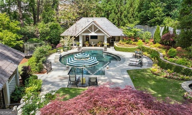 3086 Pine Valley Rd, Atlanta, GA 30305 - view of swimming pool with a storage structure, an outdoor structure, and a patio area