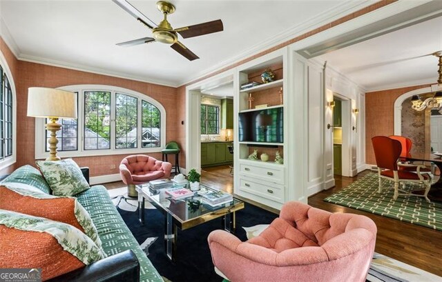 3086 Pine Valley Rd, Atlanta, GA 30305 - living room with ornamental molding, wood finished floors, a ceiling fan, and baseboards