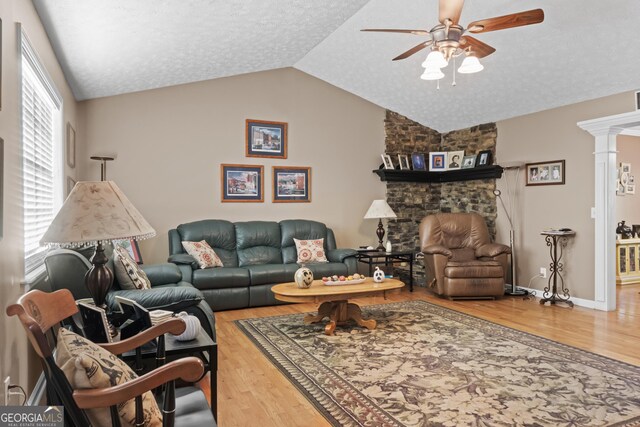 191 Roberts Way, Cornelia, GA 30531 - living room featuring a ceiling fan, lofted ceiling, a textured ceiling, and wood finished floors