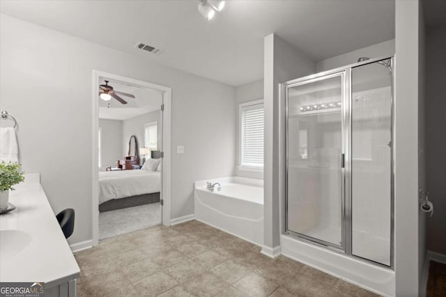 bathroom featuring a ceiling fan, ensuite bath, visible vents, a bath, and a shower stall