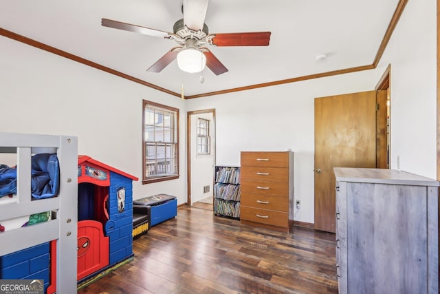 1240 C M Copelan Rd, Madison, GA 30650 - playroom with a ceiling fan, dark wood finished floors, crown molding, and baseboards