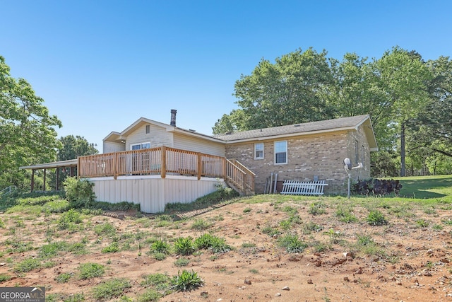 1240 C M Copelan Rd, Madison, GA 30650 - rear view of house with brick siding and stairway