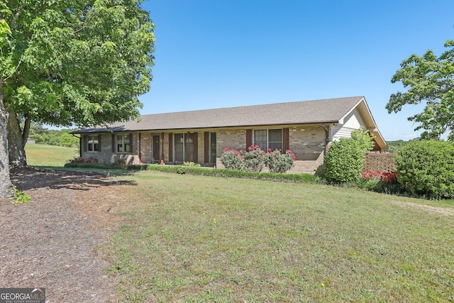 1240 C M Copelan Rd, Madison, GA 30650 - single story home featuring brick siding and a front lawn