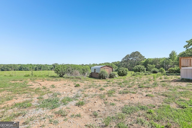 1240 C M Copelan Rd, Madison, GA 30650 - view of yard with an outdoor structure and a view of countryside