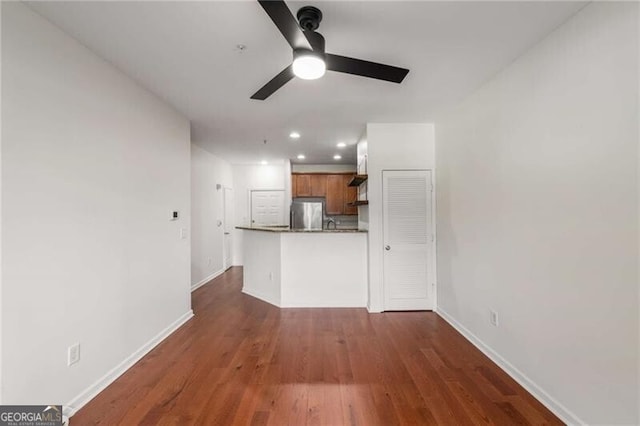 821 Ralph Mcgill Blvd NE Unit 2113, Atlanta, GA 30306 - unfurnished living room with dark wood-style flooring, baseboards, a ceiling fan, and recessed lighting