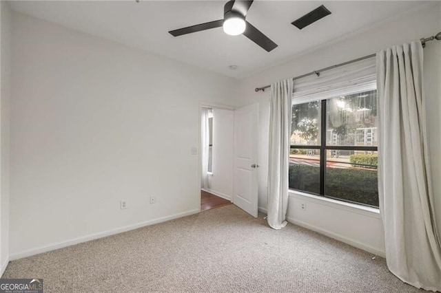 821 Ralph Mcgill Blvd NE Unit 2113, Atlanta, GA 30306 - unfurnished bedroom with baseboards, a ceiling fan, visible vents, and carpet floors