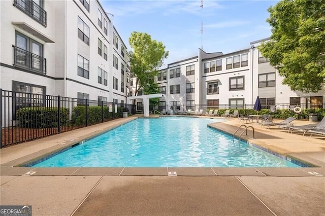 821 Ralph Mcgill Blvd NE Unit 2113, Atlanta, GA 30306 - community pool with fence and a patio area