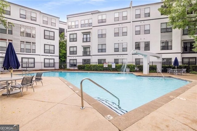 821 Ralph Mcgill Blvd NE Unit 2113, Atlanta, GA 30306 - community pool with a patio and fence