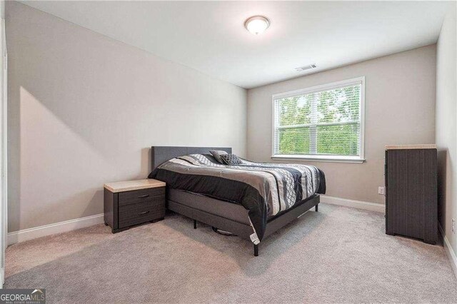 6375 Haystack Ct, Cumming, GA 30040 - carpeted bedroom featuring baseboards